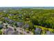 Aerial view showing the property near a serene pond, surrounded by lush greenery and neighborhood residences at 1225 Blakeway St # 1401, Charleston, SC 29492