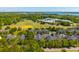 Aerial view showing the property's proximity to a vast athletic field and surrounding neighborhood at 1225 Blakeway St # 1401, Charleston, SC 29492