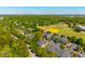 An aerial shot shows the property with sports fields and ample surrounding trees at 1225 Blakeway St # 1401, Charleston, SC 29492