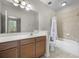 Bathroom featuring a vanity, mirror, and a shower-tub combination at 1225 Blakeway St # 1401, Charleston, SC 29492
