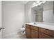 Bathroom featuring a vanity with a sink, a toilet, and a glass-enclosed shower at 1225 Blakeway St # 1401, Charleston, SC 29492