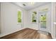 Dining area with natural light and a door to the outside at 1225 Blakeway St # 1401, Charleston, SC 29492