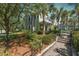 Charming two-story home with a welcoming entrance, lush landscaping, and mature trees, offering curb appeal at 1225 Blakeway St # 1401, Charleston, SC 29492