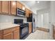 Bright kitchen showcasing modern appliances, ample counter space, and overhead cabinets at 1225 Blakeway St # 1401, Charleston, SC 29492