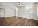 Spacious living room with wood floors, a ceiling fan, and neutral walls, ready for personalization at 1225 Blakeway St # 1401, Charleston, SC 29492
