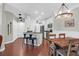 Open concept kitchen featuring a breakfast bar and modern dining area at 1300 Park West Blvd # 215, Mount Pleasant, SC 29466