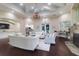 Spacious lounge area with comfortable seating, fireplace, and view of the pool at 1300 Park West Blvd # 215, Mount Pleasant, SC 29466