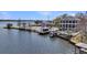 An aerial view of waterfront property and docks along a calm river at 1305 Old Rice Mill Rd, Moncks Corner, SC 29461