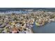 Gorgeous bird's eye view of a waterside community, showing a sprawling home with a pool and dock at 1305 Old Rice Mill Rd, Moncks Corner, SC 29461
