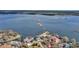 An aerial view shows homes along the waterfront with boat docks and calm river at 1305 Old Rice Mill Rd, Moncks Corner, SC 29461