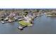 An aerial view of waterfront homes and a pier by a calm river at 1305 Old Rice Mill Rd, Moncks Corner, SC 29461