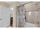 Bathroom with a shower featuring tile accents and a tub and a door that leads to another room at 1305 Old Rice Mill Rd, Moncks Corner, SC 29461