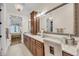Primary bathroom featuring granite counters, wooden cabinets and views to the water at 1305 Old Rice Mill Rd, Moncks Corner, SC 29461