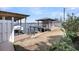 Waterfront boathouse with boat lift and covered deck, offering scenic views and direct water access at 1305 Old Rice Mill Rd, Moncks Corner, SC 29461