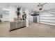 Spacious three car garage with ample storage and work area at 1305 Old Rice Mill Rd, Moncks Corner, SC 29461