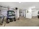 Large garage space featuring epoxy flooring and ample room for vehicle and storage at 1305 Old Rice Mill Rd, Moncks Corner, SC 29461