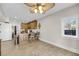 Open kitchen area featuring custom bar stools and plenty of natural light at 1305 Old Rice Mill Rd, Moncks Corner, SC 29461