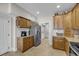 Bright kitchen featuring stainless steel refrigerator and coffee bar area at 1305 Old Rice Mill Rd, Moncks Corner, SC 29461