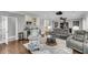 Living room featuring hardwood floors, a wet bar and modern furniture at 1305 Old Rice Mill Rd, Moncks Corner, SC 29461