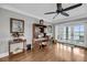 Office space with a ceiling fan, hardwood floors, and natural light from the sliding glass doors at 1305 Old Rice Mill Rd, Moncks Corner, SC 29461