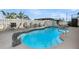 Sparkling pool with dolphin fountain and seating area, perfect for outdoor entertaining and relaxation at 1305 Old Rice Mill Rd, Moncks Corner, SC 29461