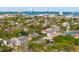 A stunning aerial view captures the city skyline, bridges, and historic architecture nestled among lush trees and waterways at 135 Beaufain St, Charleston, SC 29401