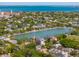 Breathtaking aerial view of the city featuring waterfront views, a serene lake, and lush green trees and landscaping at 135 Beaufain St, Charleston, SC 29401
