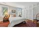 Bedroom features wood floors, natural light, and ample closet space at 135 Beaufain St, Charleston, SC 29401