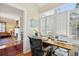 Stylish home office featuring natural light and a view into the living area at 135 Beaufain St, Charleston, SC 29401