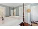Spacious main bedroom featuring hardwood floors, a closet, and ensuite access at 135 Beaufain St, Charleston, SC 29401