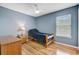 This bedroom features a bed, dresser, window, and hardwood floors at 137 Cotillion Cres, Summerville, SC 29483