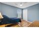 This bedroom features a bed, closet, window, and hardwood floors at 137 Cotillion Cres, Summerville, SC 29483