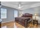 This bedroom features two windows, hardwood floors, and a bed at 137 Cotillion Cres, Summerville, SC 29483