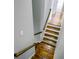 Staircase with wood treads and handrails leading to the lower level of the home at 137 Cotillion Cres, Summerville, SC 29483