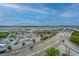 Panoramic view of a marina with boats, bridges, and waterfront activities at 14 Lockwood Dr # 9K, Charleston, SC 29401