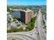High-rise building with parking surrounded by lush greenery, near a serene waterfront at 14 Lockwood Dr # 9K, Charleston, SC 29401