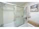 Bathroom with shower and sliding door with modern fixtures and a clean, inviting design at 14 Lockwood Dr # 9K, Charleston, SC 29401