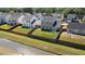 Aerial view of a fenced backyard alongside a creek, providing a secure outdoor area with peaceful waterfront scenery at 144 Marinella Dr, Goose Creek, SC 29445