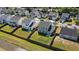 Aerial view shows a fenced backyard near a pond, offering a serene outdoor space with privacy and water views at 144 Marinella Dr, Goose Creek, SC 29445