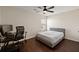 Cozy bedroom with hardwood floors, ceiling fan, and natural light from the window, creating a relaxing space at 144 Marinella Dr, Goose Creek, SC 29445