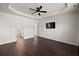 Bright main bedroom features wood floors, trey ceilings and a television at 144 Marinella Dr, Goose Creek, SC 29445