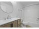 A well-lit bathroom offers a modern sink, cabinet, toilet and shower with a tub at 145 Taylor Cir, Goose Creek, SC 29445