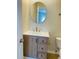 Bathroom featuring updated vanity with a sink and storage, plus an oval mirror at 145 Taylor Cir, Goose Creek, SC 29445