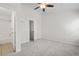 Carpeted bedroom features an ensuite bathroom and access to the upstairs hallway at 145 Taylor Cir, Goose Creek, SC 29445