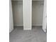 Spacious bedroom walk-in closet with ample storage and neutral carpeting at 145 Taylor Cir, Goose Creek, SC 29445