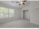 Bright bedroom with a ceiling fan, carpet, and a closet provides ample storage at 145 Taylor Cir, Goose Creek, SC 29445