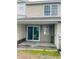 Private patio offers outdoor living space with a door and grassy area at 145 Taylor Cir, Goose Creek, SC 29445