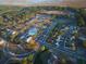 Aerial view of a neighborhood featuring a pool, clubhouse, and well-maintained streets surrounded by lush greenery at 1472 Longspur Dr, Mount Pleasant, SC 29466