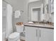 Neutral bathroom featuring a shower with a white curtain, a toilet, and a vanity with gray countertop at 1472 Longspur Dr, Mount Pleasant, SC 29466