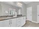 Bathroom featuring double sinks, gray countertop, and a large mirror at 1472 Longspur Dr, Mount Pleasant, SC 29466